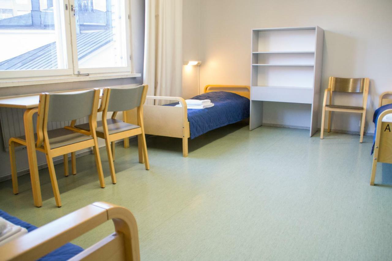 Budget Eenpersoonsbed in Vrouwenslaapzaal met 3 Bedden en Gedeelde Badkamer